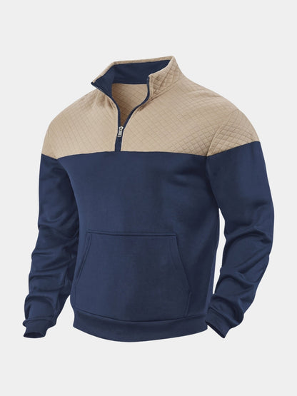 Navy and tan quilted-yoke quarter-zip pullover, front view